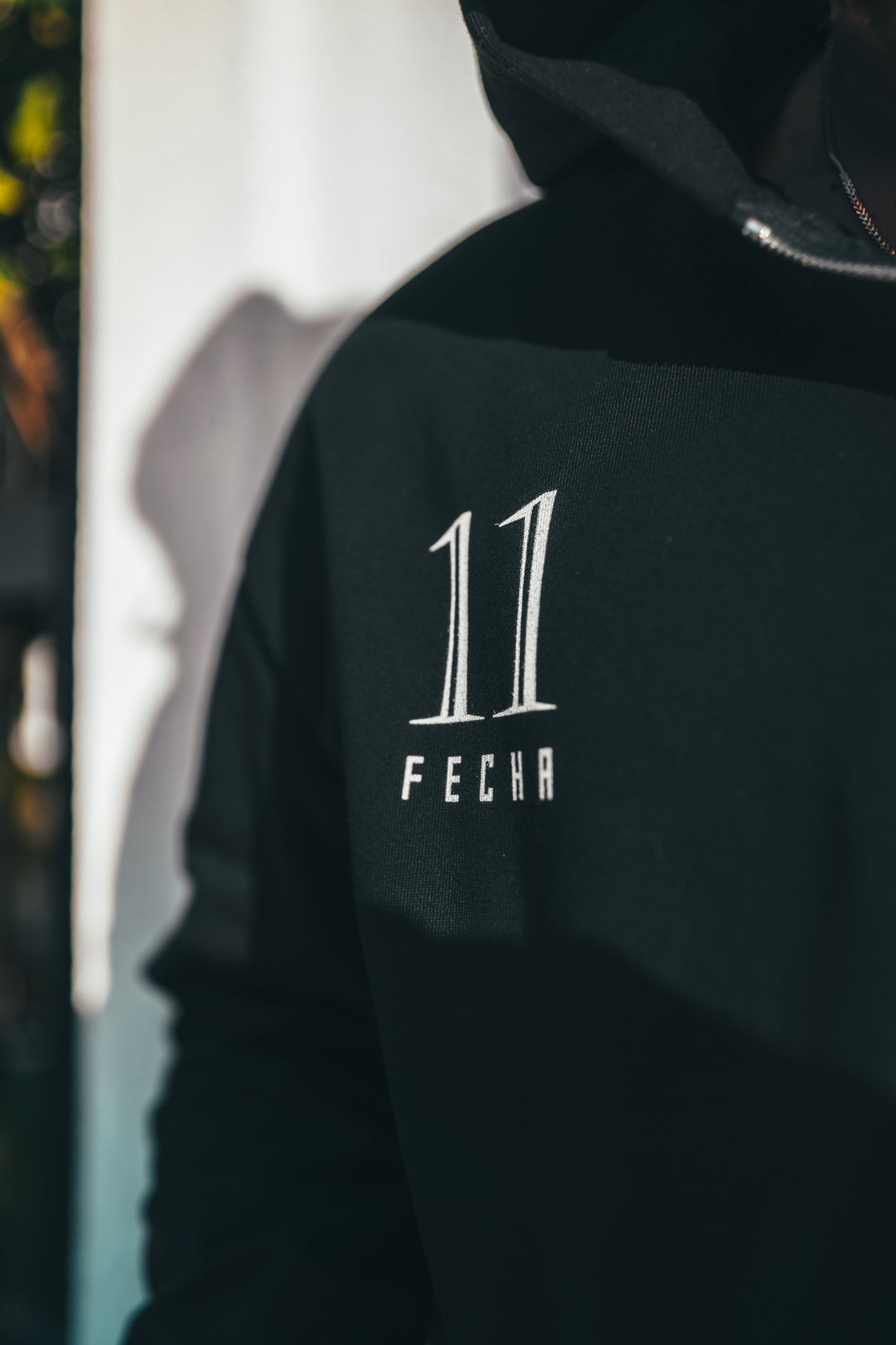 Black zip hoodie with patch